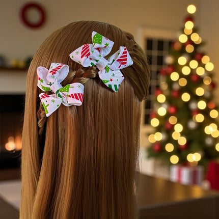 12 Pares de moñitos Santa Navideños $5.6 c/u