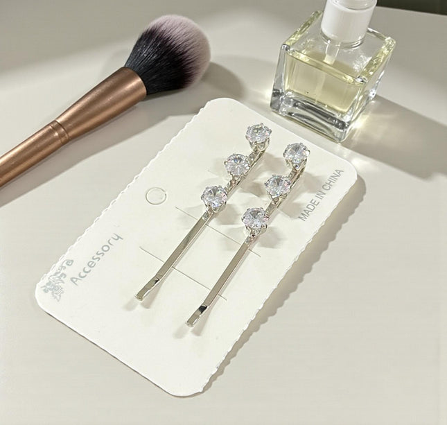 12 Pares de Pasadores Plateados con Pedrería $8.25 c/u