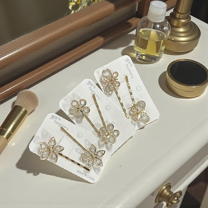 12 Pares de Pasadores Dorados con Pedrería $8.6 c/u