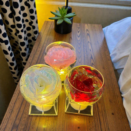 12 Rosa Eterna con Base y Luz Chica $27 c/u