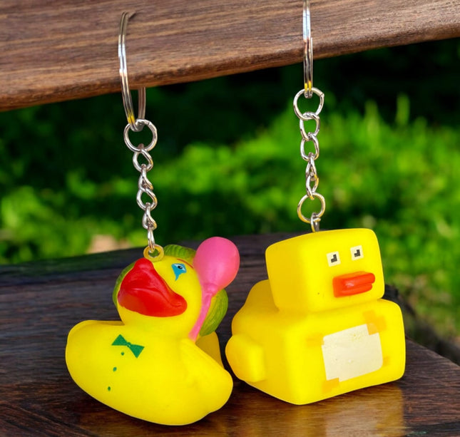 12 Llaveros patito figuras $6.9 c/u