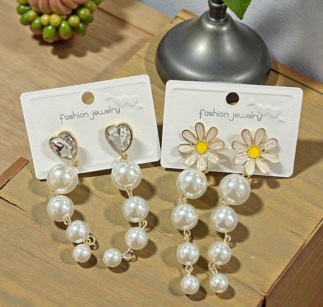 12 Aretes Perlas Colgantes con Pedreria $13.7 c/u