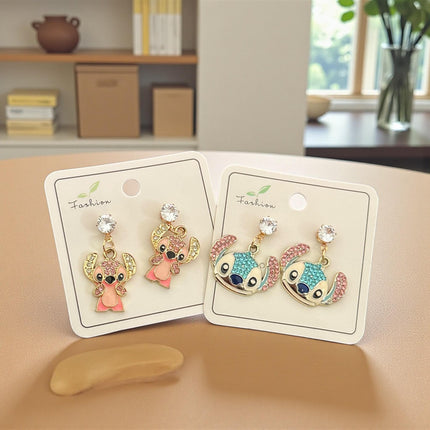 12 Aretes Sticht Pedreria $15 c/u