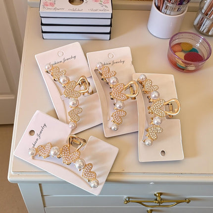 12 Pinzas Doradas Corazones con Perlas $18 c/u