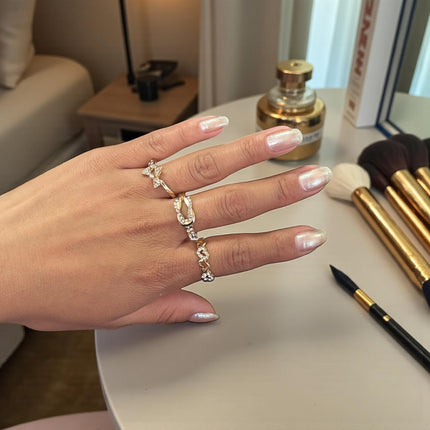 12 Anillos Dorados Figuras con Pedreria $5.7 c/u