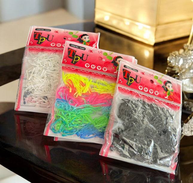 12 Bolsas de Ligas Latex para Cabello de colores $3.3 c/u