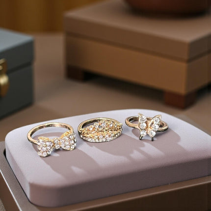 12 Anillos Dorados Figuras con Pedreria $5.7 c/u