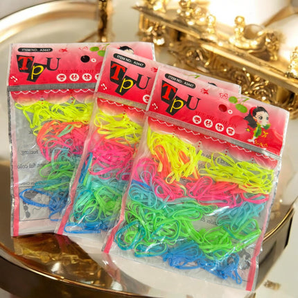 12 Bolsas de Ligas Latex para Cabello de colores $3.3 c/u