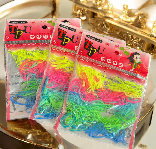 12 Bolsas de Ligas Latex para Cabello de colores $3.3 c/u