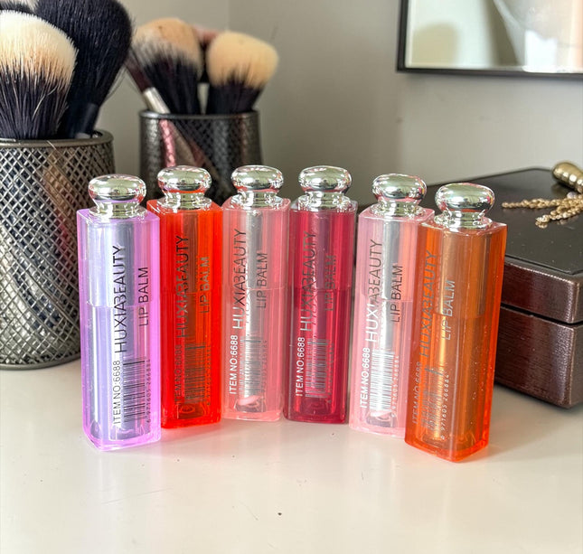 12 Balsamo Labial Huxia Beauty $13 c/u