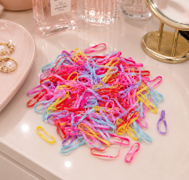 12 Bolsas de Ligas Latex Colores para Cabello $4.9 c/u