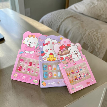 12 Sets de Uñas Infantiles $8 c/u