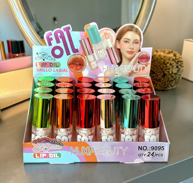 24 Gloss "Fat Oil" Magico Huxia $10.5 c/u