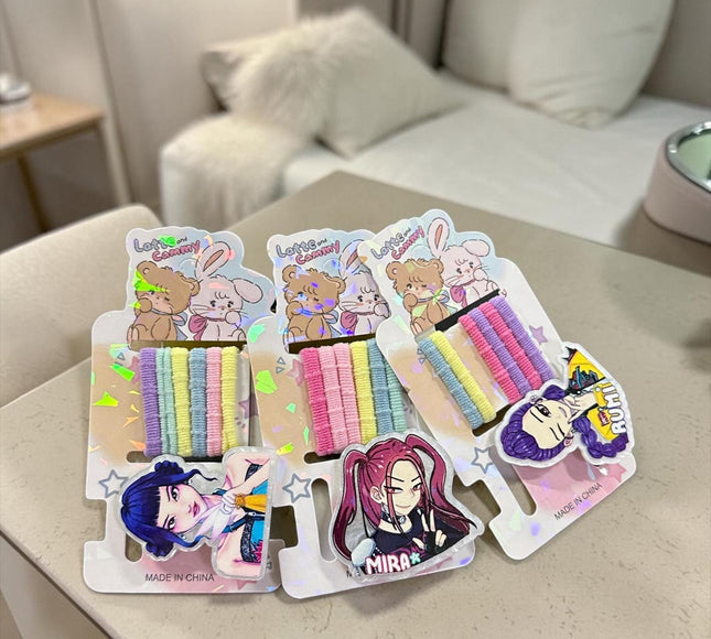 12 Sets Guerreras K-Pop Donas de Colores y Pasador $6.5 c/u