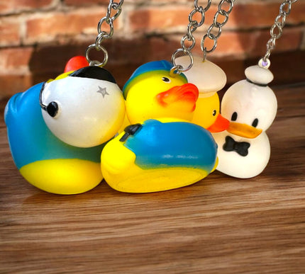 12 Llaveros patito figuras $6.9 c/u