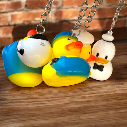 12 Llaveros patito figuras $6.9 c/u