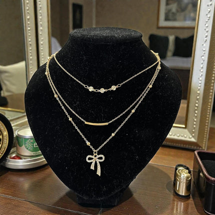 12 Collares Triples con Dijes Perlas/Pedreria $16 c/u