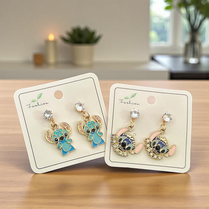 12 Aretes Sticht Pedreria $15 c/u