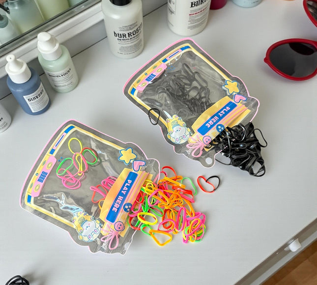 12 Bolsita de Ligas para Cabello Colores $5.9 c/u