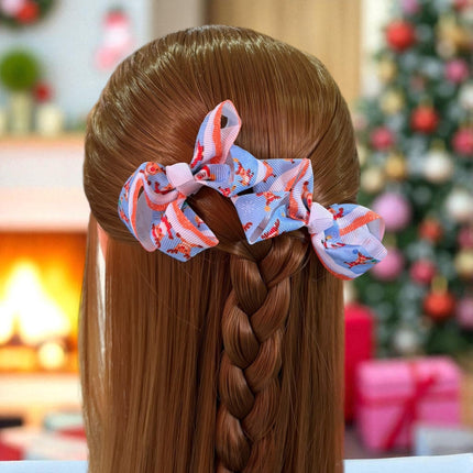 12 Pares de Moñitos Navideños Estampados $7.5 c/u