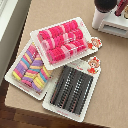 12 Estcuches de Donitas para Cabello Colores $8.3 c/u