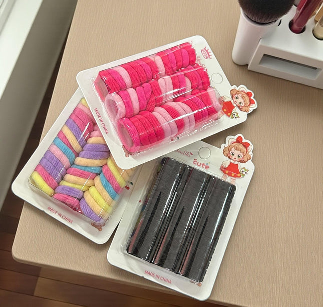 12 Estcuches de Donitas para Cabello Colores $8.3 c/u