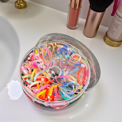 12 Estuches Donas con Ligas para Cabello $11.5 c/u