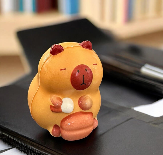 12 Squishies capibaras G $13.5 c/u