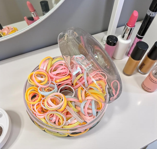 12 Estuches Donas con Ligas para Cabello $11.5 c/u