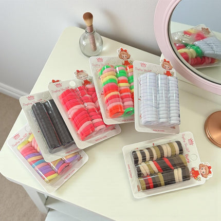 12 Estcuches de Donitas para Cabello Colores $8.3 c/u