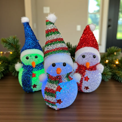 6 Muñeco de Nieve Navideño con luces y Gorro  $25 c/u