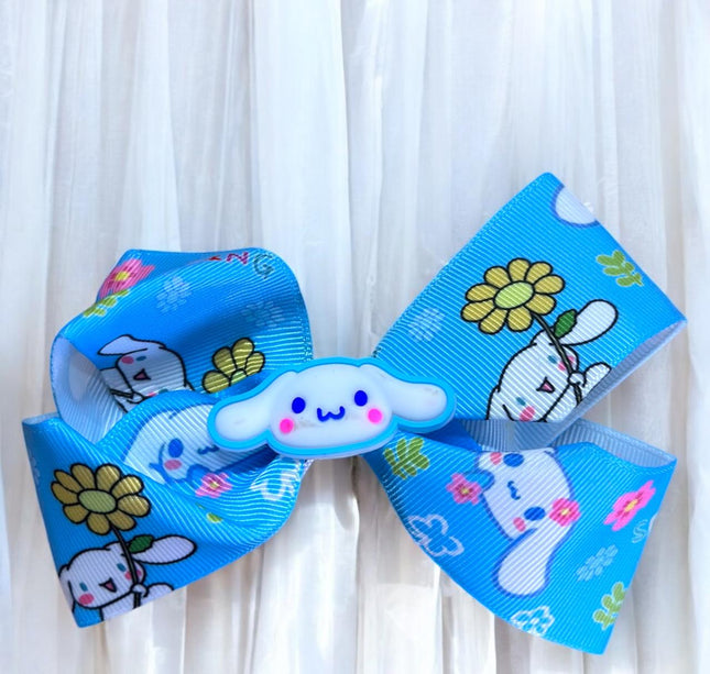 12 Moños Sanrio Dobles con Carita Hermosa $6.9 c/u