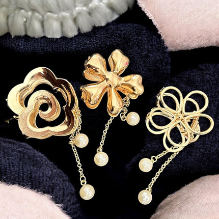 12 Pinzas Flores Metalicas Diferentes con Perlitas $18 c/u