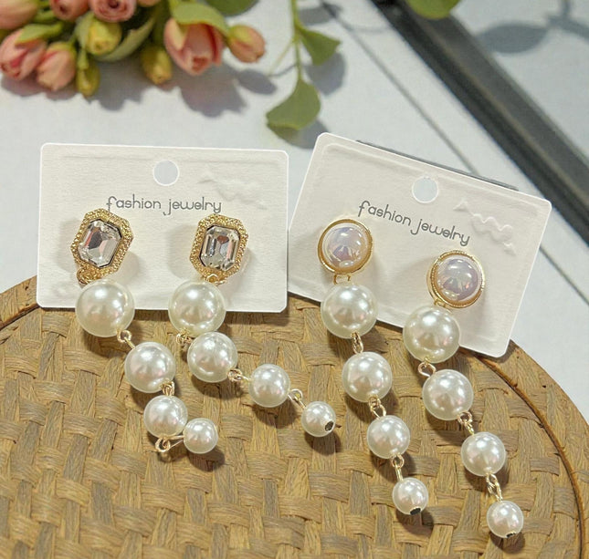 12 Aretes Perlas Colgantes con Pedreria $13.7 c/u