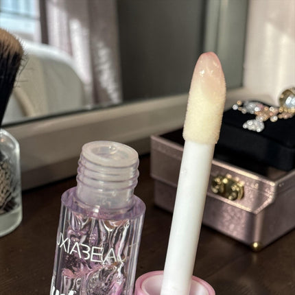 12 Gloss Conejito Huxia Beauty $11 c/u
