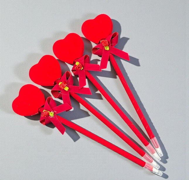 12 Plumas Corazon con Luz "San Valentin" $10.8 c/u