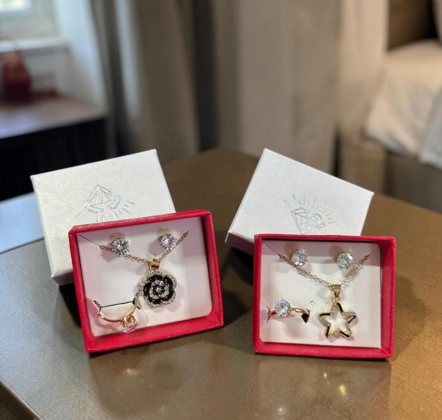 12 Sets Joyeria Collar,Anillo y Aretes con Pedreria y Caja de Regalo Dorada $22.5 c/u