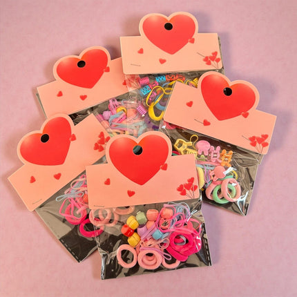 12 Sets de Accesorios para Cabello "Corazon" $5.9 c/u