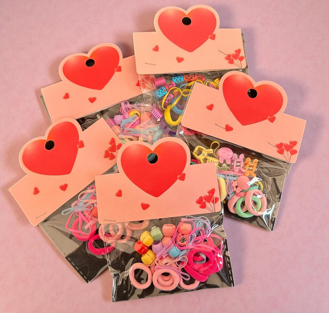 12 Sets de Accesorios para Cabello "Corazon" $5.9 c/u
