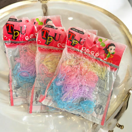 12 Bolsas de Ligas Latex para Cabello de colores $3.3 c/u