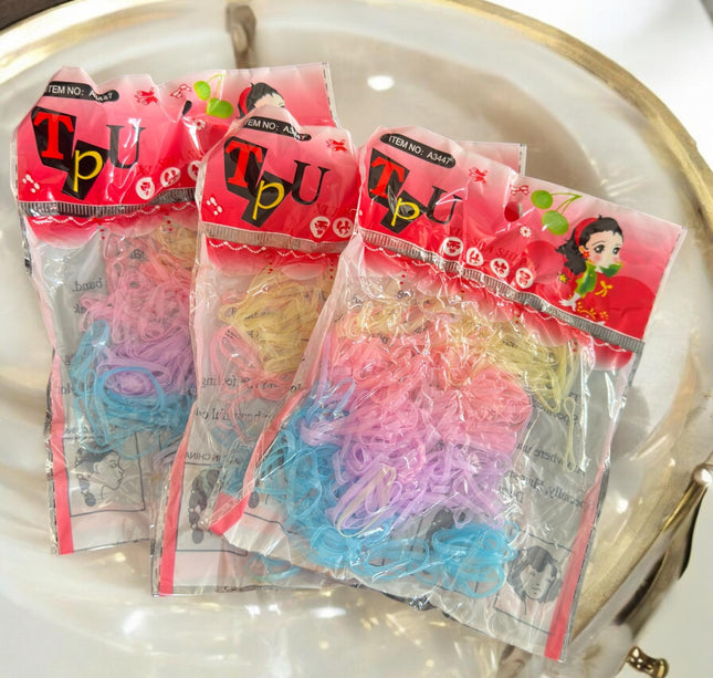 12 Bolsas de Ligas Latex para Cabello de colores $3.3 c/u