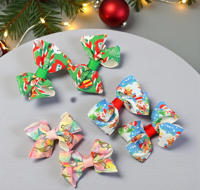 12 Pares de moñitos Santa Navideños $5.6 c/u