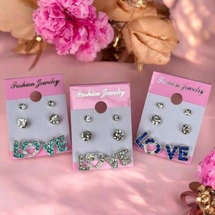 12 Sets de 3 Pares de Aretes Love $7.8 c/u