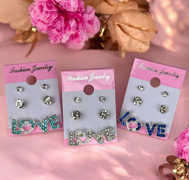 12 Sets de 3 Pares de Aretes Love $7.8 c/u