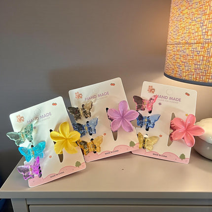 12 Sets Pincita Hawaiana con 3 Mariposas $6.5 c/u