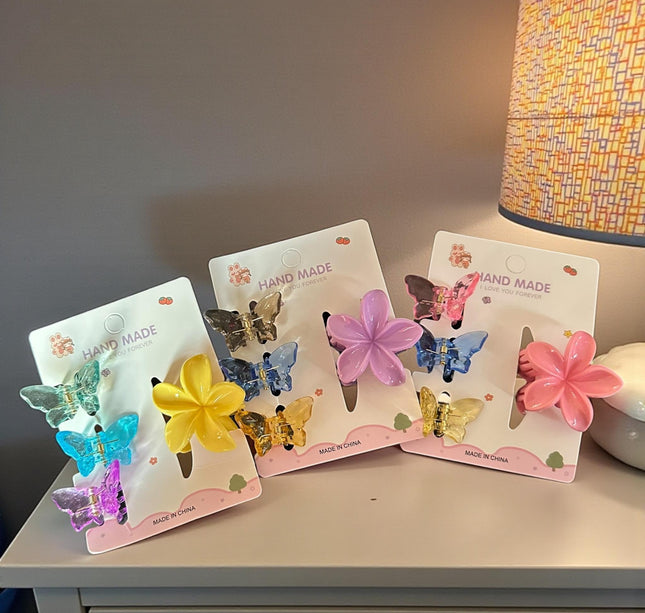 12 Sets Pincita Hawaiana con 3 Mariposas $6.5 c/u