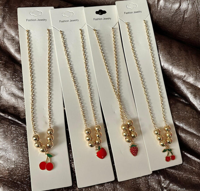 12 Collares Cerezas/Fresas Bolitas $8.3 c/u