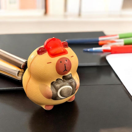 12 Squishies capibaras G $13.5 c/u