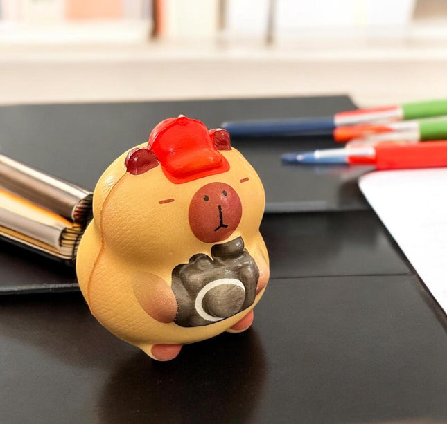 12 Squishies capibaras G $13.5 c/u