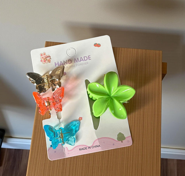 12 Sets Pincita Hawaiana con 3 Mariposas $6.5 c/u